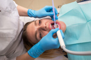 Close-up of a patient receiving a professional dental cleaning